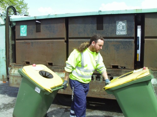 flats recycling man + two bins